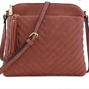 Crossbody Bag with Tassel Accent in Redstone